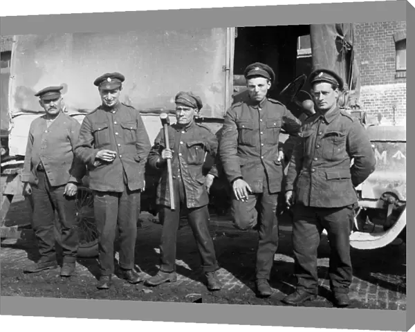 Soldiers in front of a military covered lorry, Cornwall. 1916
