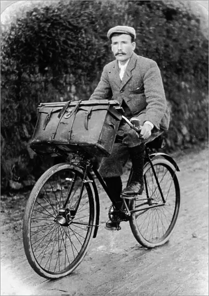 Samuel John Govier on his bicycle with his photographic box on the front, Cornwall. Early 1900s