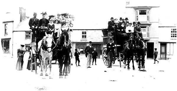 Two crowded horse buses in Market Square, St Just in Penwith, Cornwall. Early 1900s