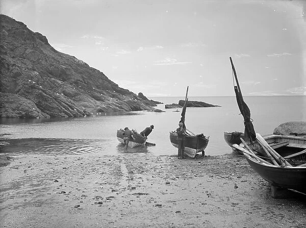 Fishing boats and fishermen on beach, Portloe, Veryan, Cornwall. 1912