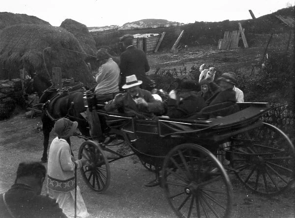 Horse drawn carriage with passengers, Cornwall. Possibly 1920s