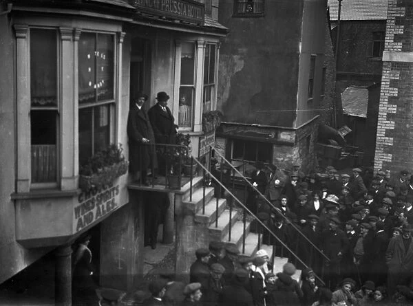 A meeting outside The King of Prussia Inn, Fowey, Cornwall. 1912