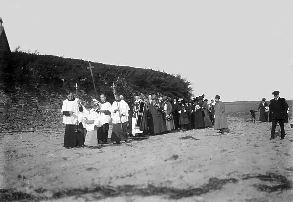 Procession across the beach at Gunwalloe Church Cove, Cornwall. Early 1900s