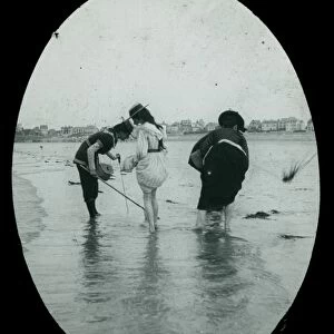 Ladies paddling on an unknown beach, Cornwall. Around 1925