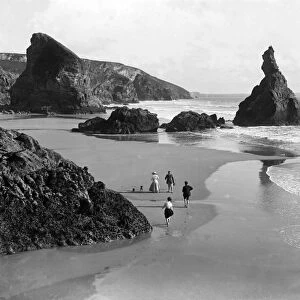 People on the beach at Bedruthan Steps, St Eval, Cornwall. Around 1900