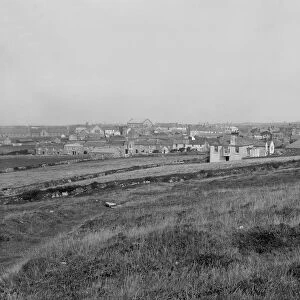 View across the fields to St Just in Penwith Churchtown, Cornwall. Early 1900s