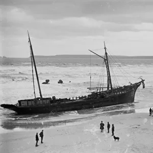 The wreck of the collier Bessie, with all that remains of the wrecked Vulture in the surf beyond, Carbis Bay, Lelant, Cornwall. 1893