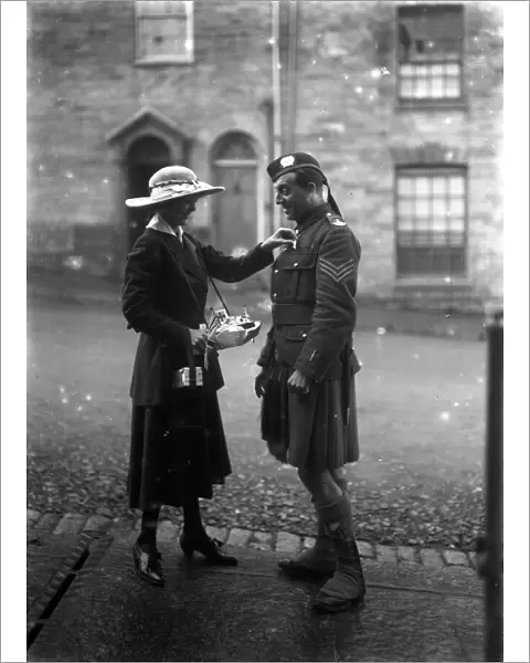 Lady and soldier on Flag Day, Lemon Street, Truro, Cornwall. 18th October 1916