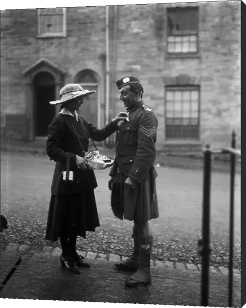 Lady and soldier on Flag Day, Boscawen Street, Truro, Cornwall. 18th October 1916