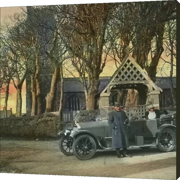 Major Gills car by church lychgate, Kilkhampton church, Cornwall. Around 1925