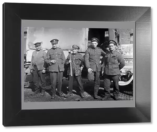 Soldiers in front of a military covered lorry, Cornwall. 1916