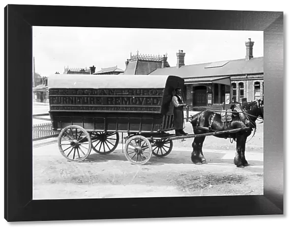 R & J Lean furniture remover wagon outside Truro Railway Station, Cornwall. After 1893