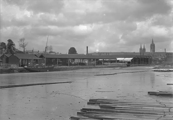 Garras Wharf and Harveys Timber Yard with timber raft on the Truro River, Truro, Cornwall. After 1910