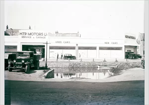 H. T. P. Motors Ltd, Back Quay, Truro, Cornwall. Taken before the the last section of the river was covered over in 1938