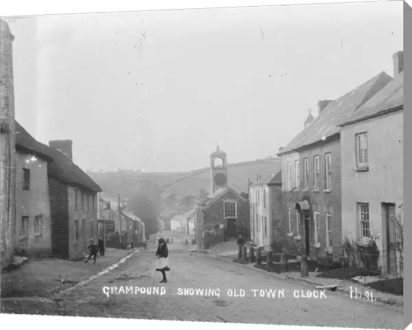 Grampound showing old town clock, Fore Street, Grampound, Cornwall. Early 1900s