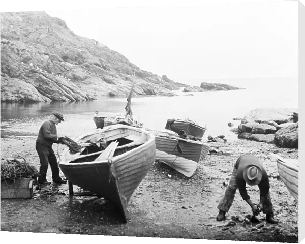Beach at Portloe with six boats and fishermen working, Veryan, Cornwall. 1912