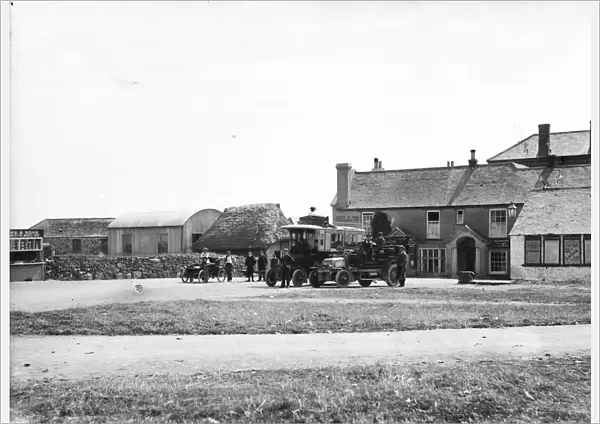 Motor car and motor buses outside Hills Hotel, The Lizard, Landewednack, Cornwall. After 1903