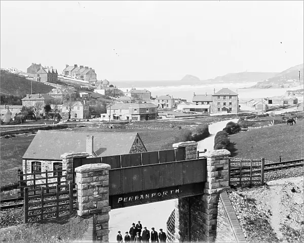View of town and beach over the railway bridge, Perranporth, Perranzabuloe, Cornwall. Early 1900s