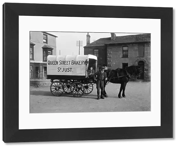 Horse drawn van of the Queen Street Bakery in Bank Square, St Just in Penwith, Cornwall. Early 1900s