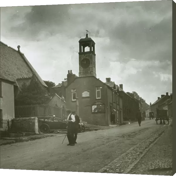 Town Clock and Major Gills car, Grampound, Cornwall. Around 1925