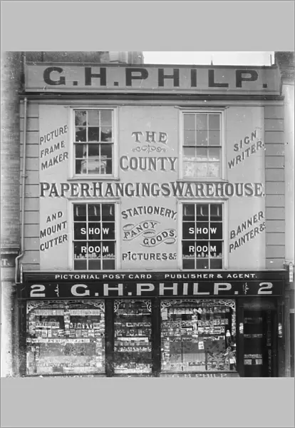 Shop front of G. H. Philp, 2 King Street, Truro, Cornwall. Around 1910