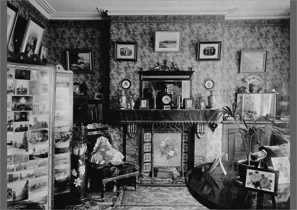 A view of the living room in Samuel John Goviers house, Chacewater, Cornwall. Early 1900s