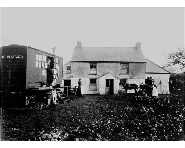 Samuel John Goviers photographic van by an unidentified cottage, presumably in West Cornwall. Early 1900s