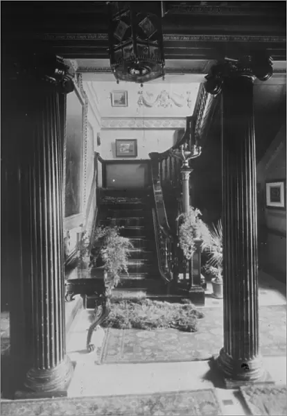 Entrance hall and staircase of Princes House, Princes Street, Truro, Cornwall. Around 1900