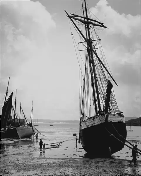 The schooner Atlas on the beach in the harbour at low tide, St Ives, Cornwall. 1904