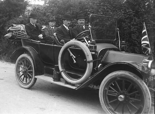 Buick motor car with four male passengers. Around 1912