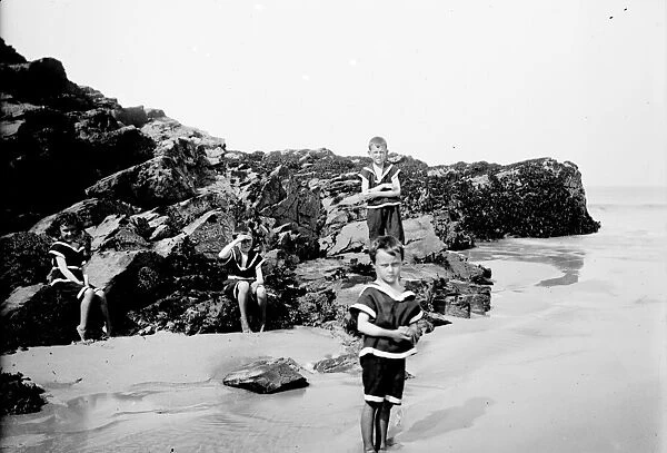 Children playing on the beach at St Georges Cove, Padstow, Cornwall. Early 1900s