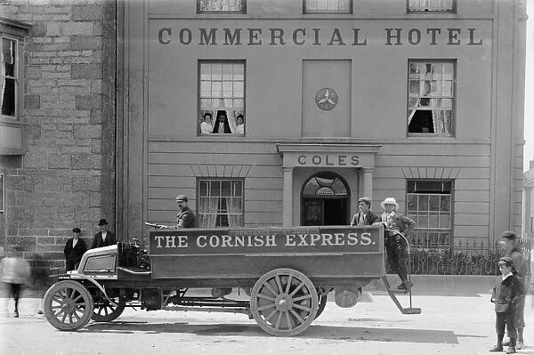 The Cornish Express motor bus (Penzance to St Just) outside the Commercial Hotel in Market Square, St Just, Cornwall. Before 1906