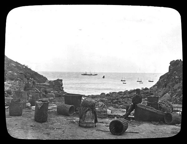 The cove and bay with crab and lobster pots, Porthgwarra, Cornwall. Early 1900s