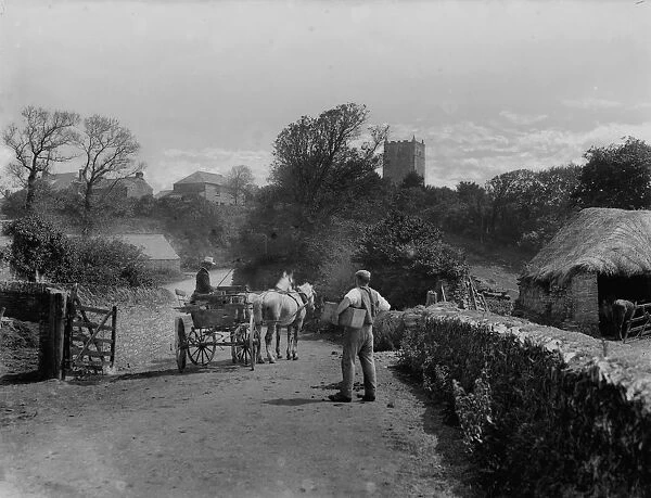 Distant view of St Merryn Church with horse and trap and figures in foreground from Treveglos, St Merryn, Cornwall. 1906