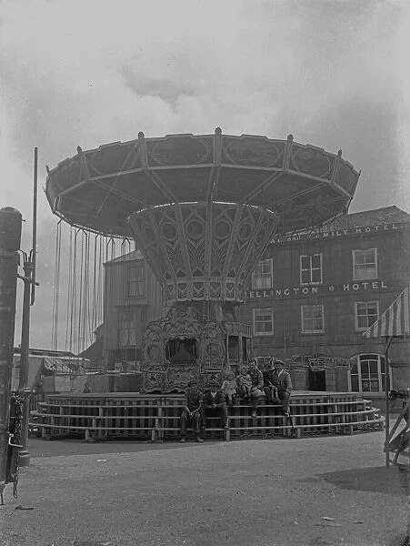 Fairground in Market Square, St Just in Penwith, Cornwall. Around 1920