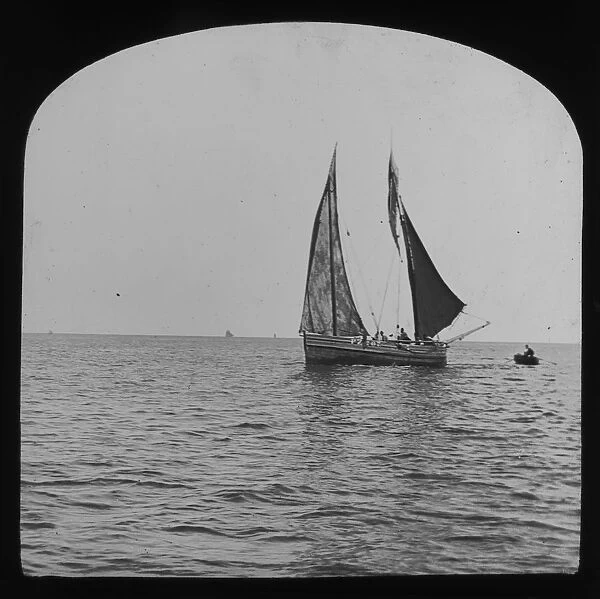 Fishing boat at sea under sail, Cornwall. Around 1900