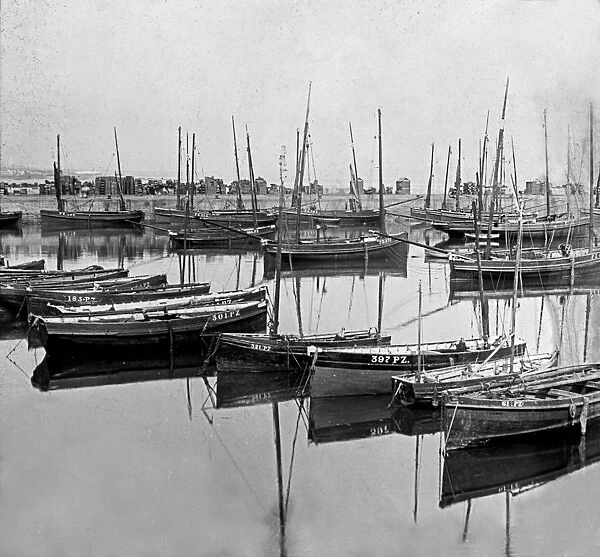 The Fleet in Port, Newlyn Harbour, Cornwall. Around 1900
