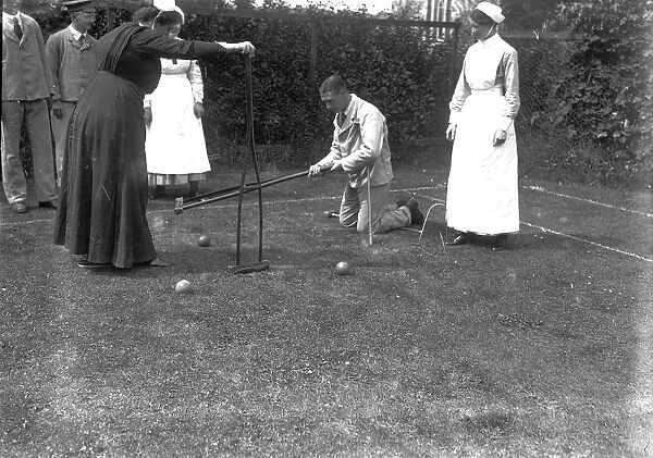A game of croquet outside the Royal Cornwall Infirmary, Truro, Cornwall. Probably 21st July 1916