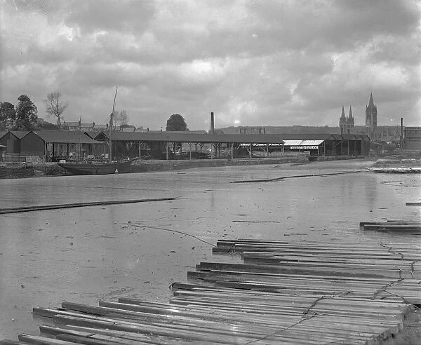 Garras Wharf and Harveys Timber Yard with timber raft on the Truro River, Truro, Cornwall. After 1910