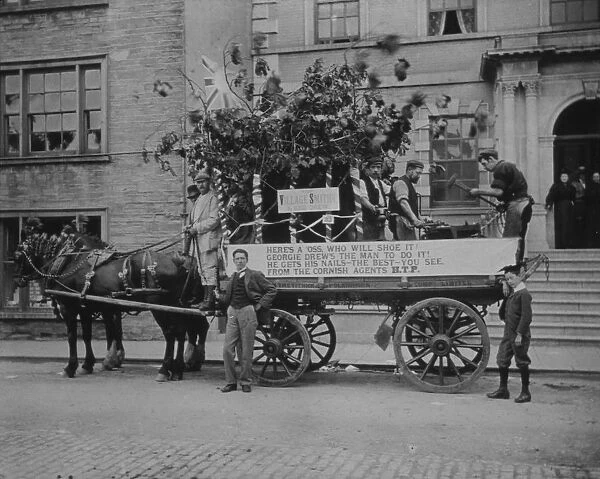 H. T. P. & Company Ltd.s jubilee float advertising The Village Smithy by Geo. Drew, Princes Street, Truro, Cornwall. 1897