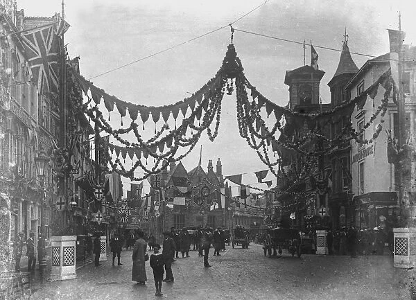 A highly decorated Boscawen Street looking east, Truro, Cornwall. Thought to be 27th May 1913 but possibly earlier