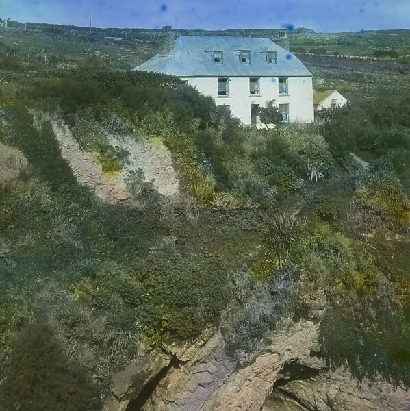 House above the cliff at the back of Bessies Cove, Prussia Cove, St Hilary, Cornwall. Around 1925