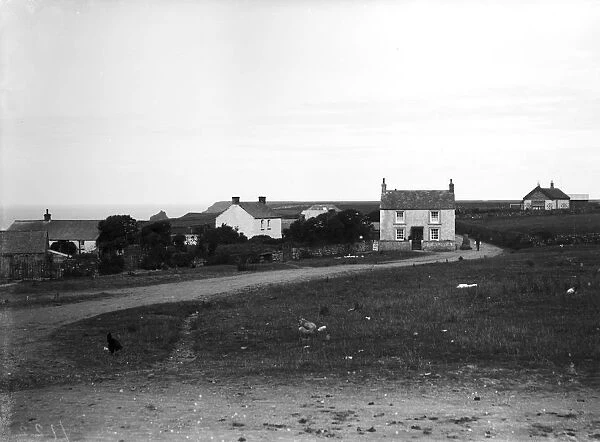 Houses on the north side of the green, The Lizard, Landewednack, Cornwall. Early 1900s