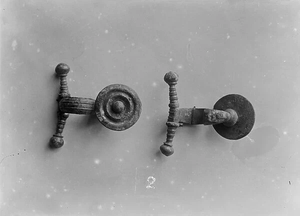 Two Iron Age brooches from the Iron Age cemetery at Harlyn Bay, St Merryn, Cornwall. 1900-1906