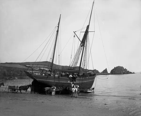 Ketch Elizabeth loading cargo at Mother Iveys Bay, St Merryn, Cornwall. Early 1900s