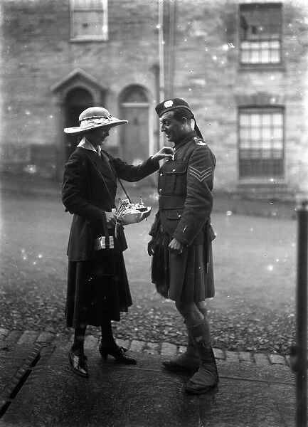 Lady and soldier on Flag Day, Lemon Street, Truro, Cornwall. 18th October 1916