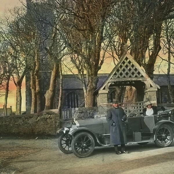 Major Gills car by church lychgate, Kilkhampton church, Cornwall. Around 1925