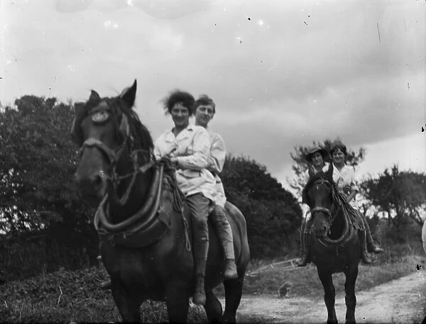 Members of the First World War Womens Land Army riding working horses. Cornwall. Around 1917