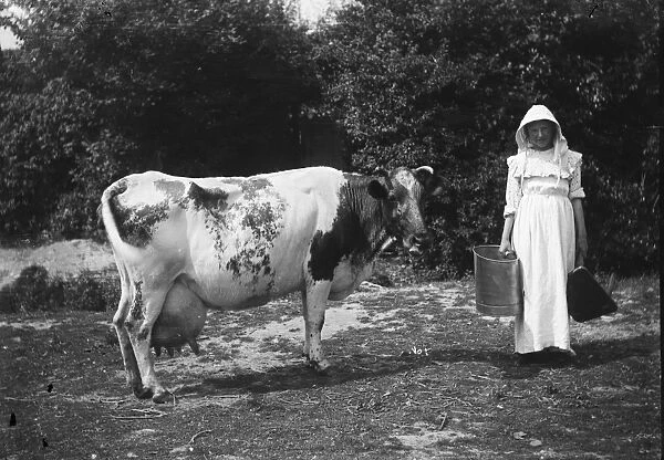 Milkmaid, Cornwall. Early 1900s
