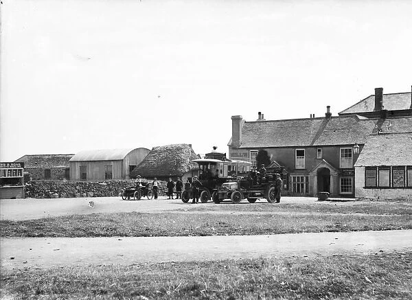 Motor car and motor buses outside Hills Hotel, The Lizard, Landewednack, Cornwall. After 1903